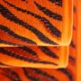 Kép 7/8 - Burn narancs tigriscsíkos törölköző bordűr